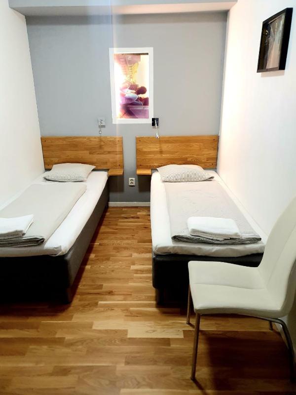 Twin Room with Shared Bathroom (No Window) image 1