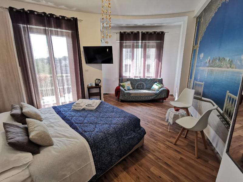 Deluxe Quadruple Room image 1