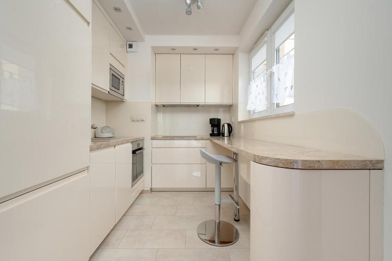 Beautiful Apartment with a Spacious Balcony in Wrocław by Noclegi Renters - image 11
