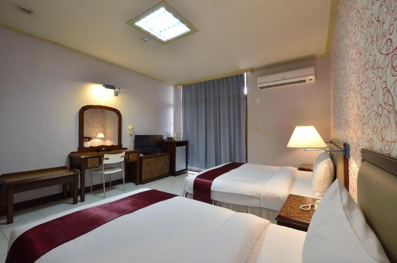 Jiuning Business Hotel - image 9