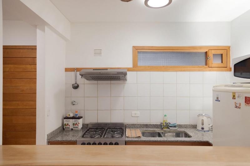 Depto Centrico con pequeño jardin y parrilla - image 11