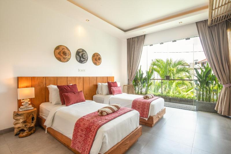 Exquisite 4BR Haven 5min Stroll to Beach Canggu - image 11