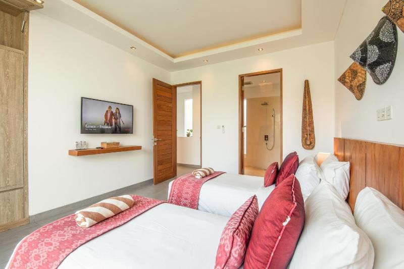 Exquisite 4BR Haven 5min Stroll to Beach Canggu - image 10