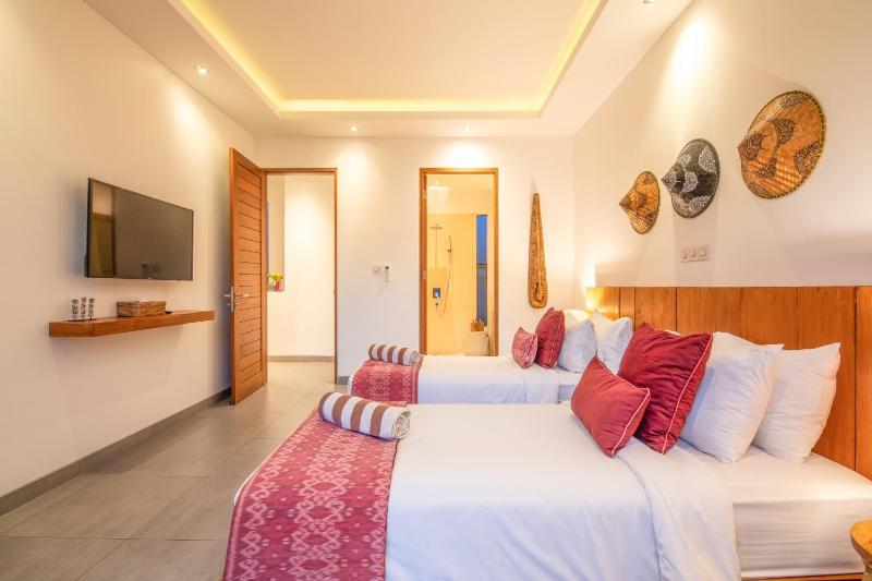 Exquisite 4BR Haven 5min Stroll to Beach Canggu - image 19