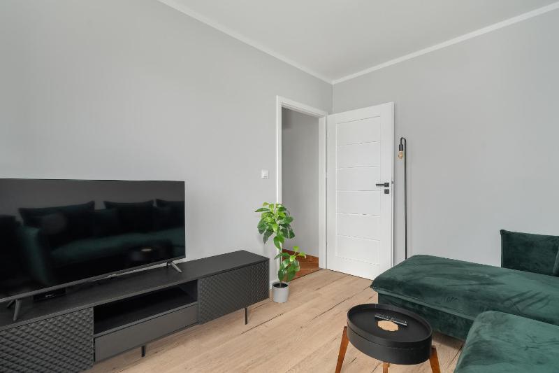 Spacious Apartment Ideal for Families by Noclegi Renters - image 20
