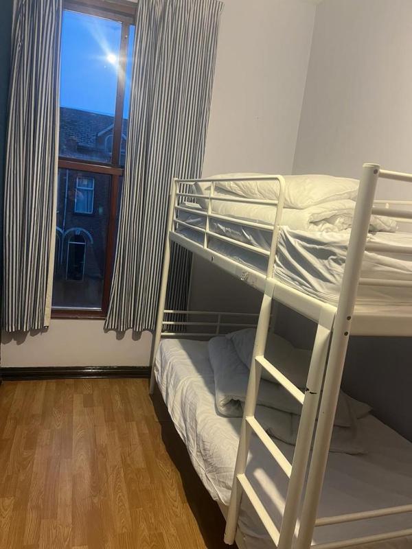 Bunk Room with Shared Bathroom image 1
