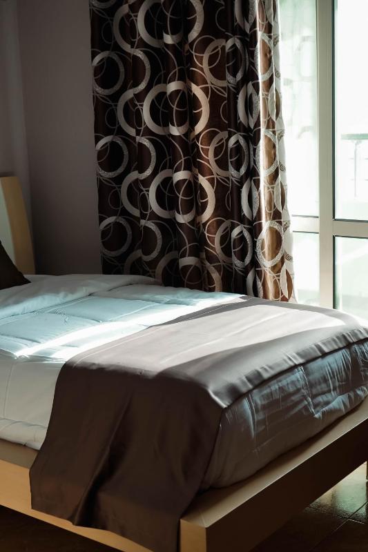 Quadruple Room with Balcony and Partial Sea View image 4