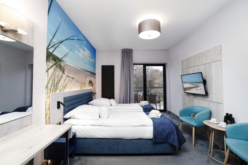 Double or Twin Room with Side Sea View image 1