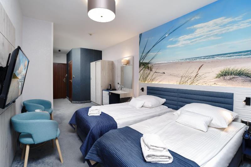 Double or Twin Room with Side Sea View image 4