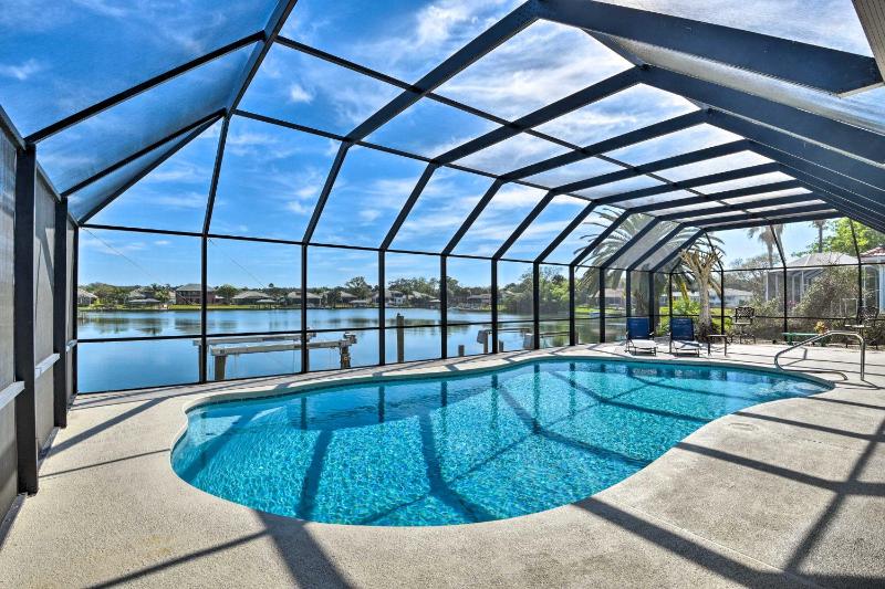 Palm Coast Home Pool, Lanai and Private Dock! Images