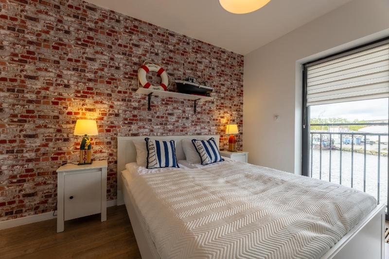 Apartamenty Bałtyckie - Bulwar Portowy - widok na port centrum najlepsza lokalizacja w Ustce - image 21