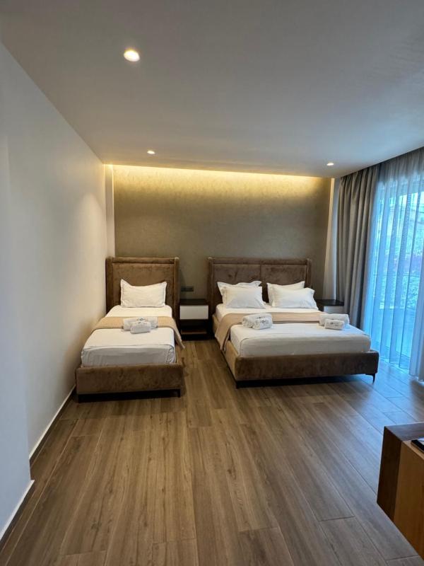 Deluxe Triple Room with Balcony - Ground Floor image 1