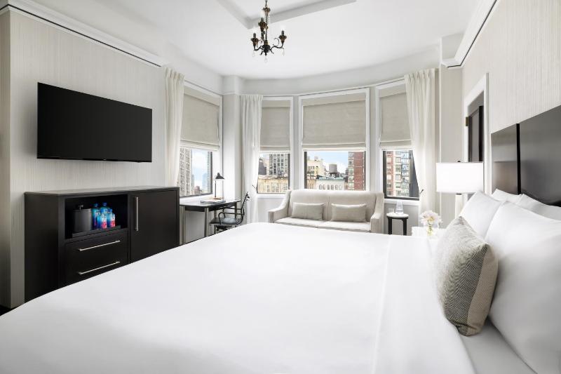Deluxe King Room with Sofa Bed image 1