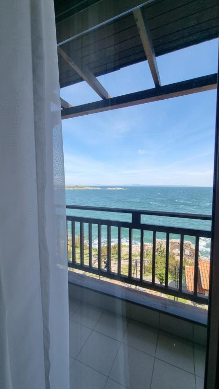 Double or Twin Room with Side Sea View image 4