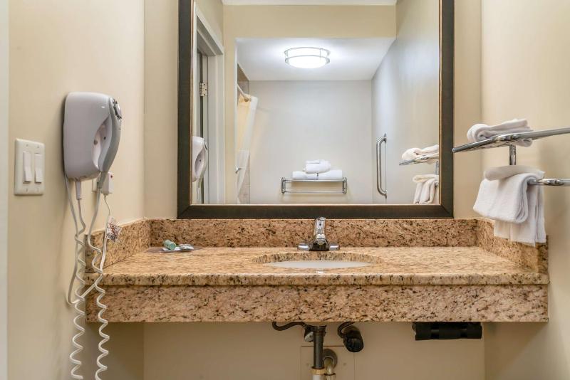 Queen Room with Two Queen Beds - Disability Access Tub image 2