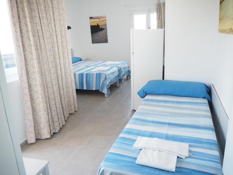 Triple Room with Balcony City Views image 3