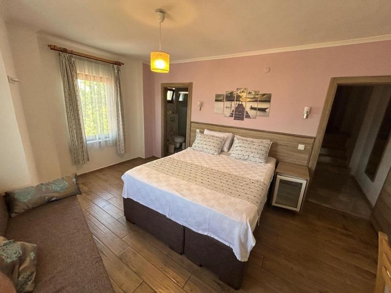Deluxe Quadruple Room with Sea View image 3
