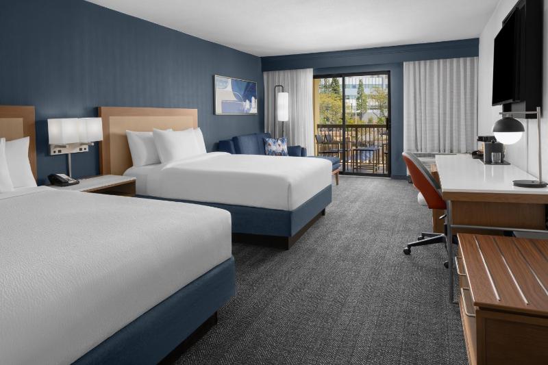 Queen Room with Two Queen Beds and Balcony image 1