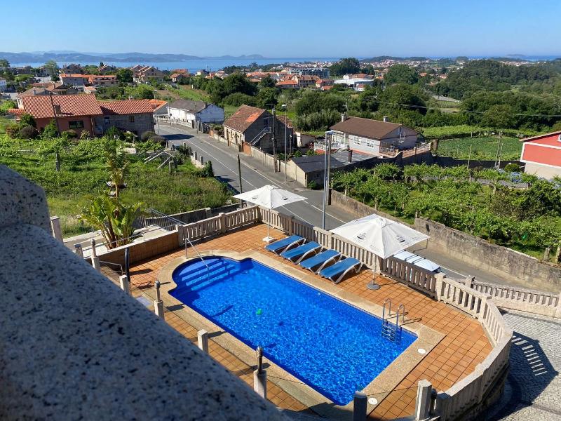 Duplex en Sanxenxo con piscina y vistas al mar - image 12