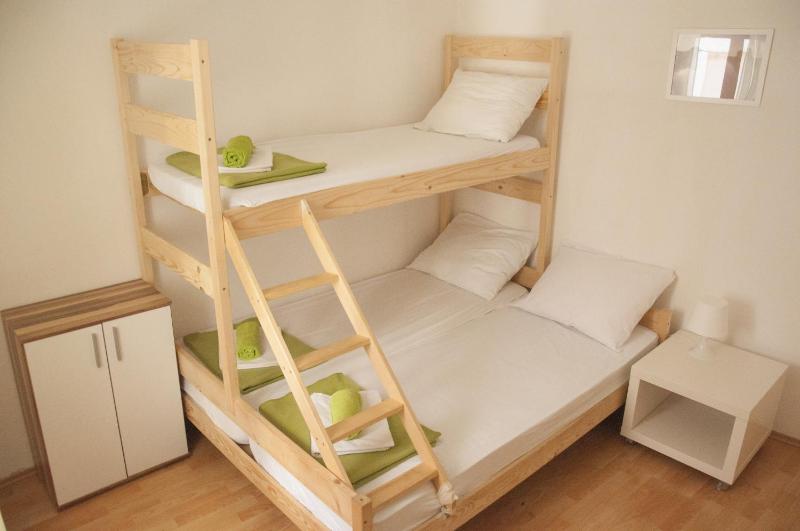 Basic Triple Room with Shared Bathroom image 3