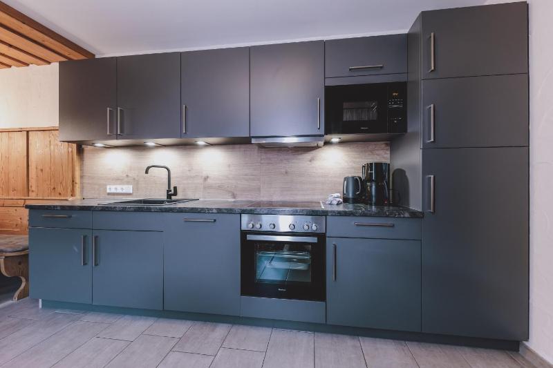 Four-Bedroom Apartment with Sauna image 2