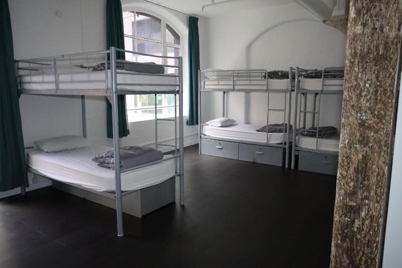 Bed in 10-Bed Mixed Dormitory Room with Shared Bathroom image 1
