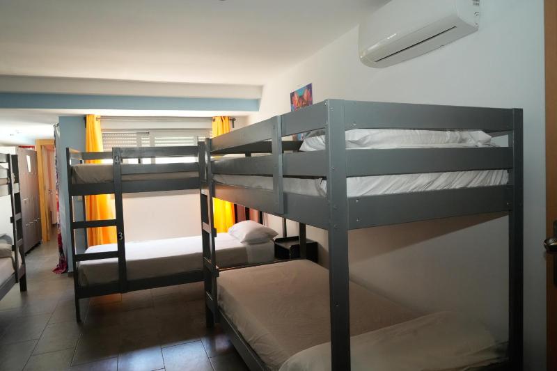 Single Bed in Male Dormitory Room image 2