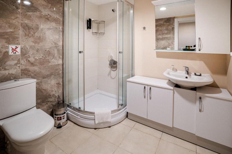 Three-Bedroom Apartment with Patio image 2