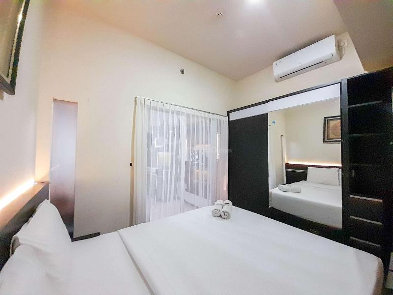 Brand New and Good Simply 1BR at Uttara The Icon Apartment By Travelio - image 11
