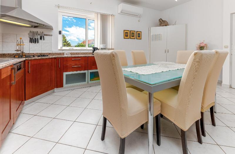 Three-Bedroom Apartment with Balcony image 1