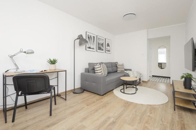 Elegant Grey Apartment Wspólna Śródmieście in Warsaw by Noclegi Renters - image 5