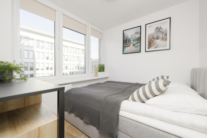 Elegant Grey Apartment Wspólna Śródmieście in Warsaw by Noclegi Renters - image 6