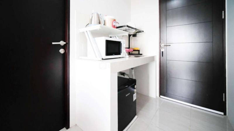 Well Furnished and Homey Studio (No Kitchen) Apartment at Suncity Residence By Travelio - image 11