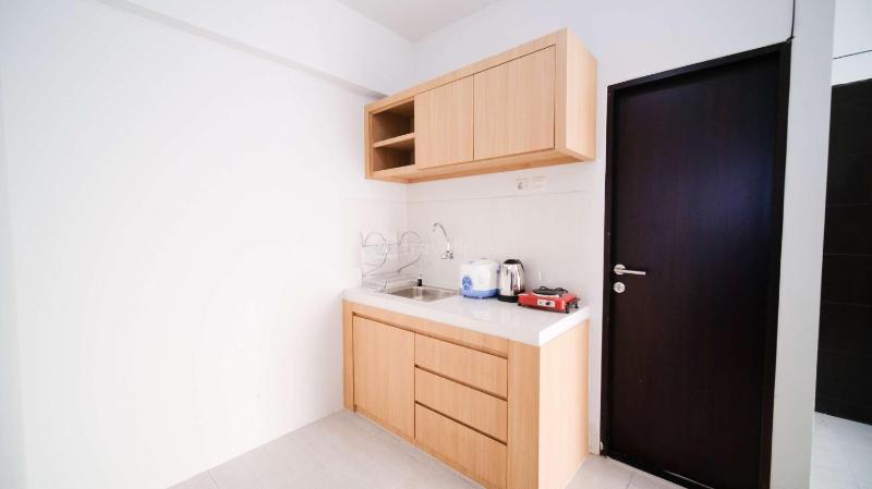 Homey and Comfy 2BR Apartment at Suncity Residence By Travelio - image 10