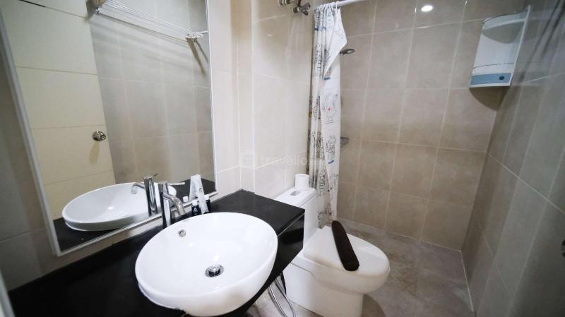 Best Location and Tidy 2BR Apartment at Trillium Residence By Travelio - image 13