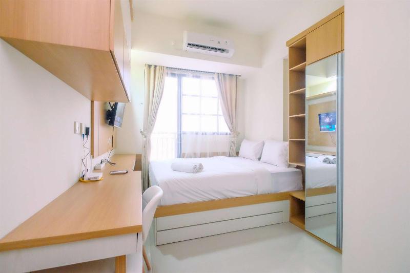 Good Choice and Strategic 2BR without Living Room Evenciio Apartment By Travelio - image 8