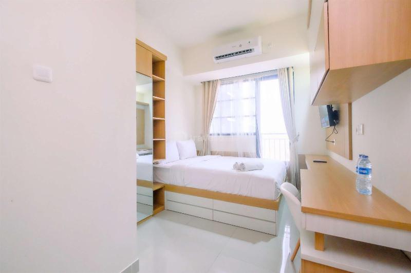 Good Choice and Strategic 2BR without Living Room Evenciio Apartment By Travelio - image 13