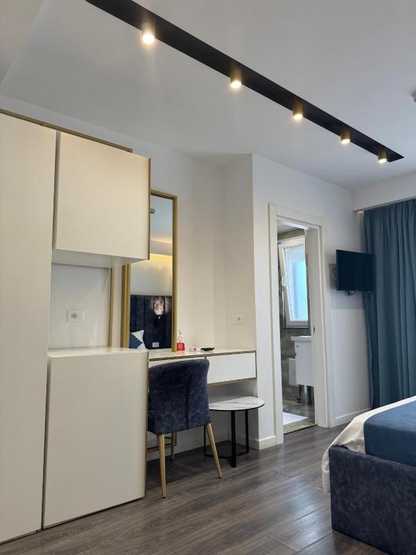 Deluxe Quadruple Room image 2