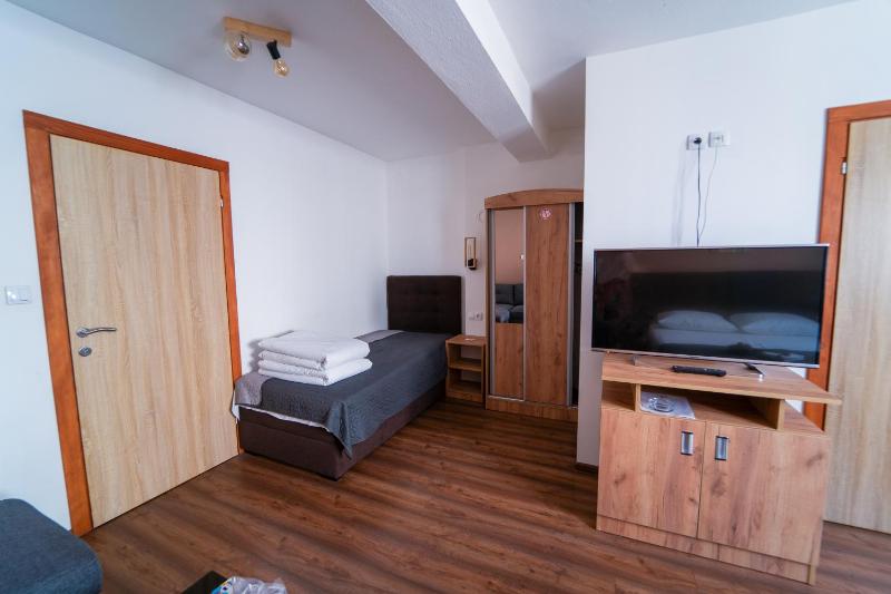 Quadruple Room with Private Bathroom image 1