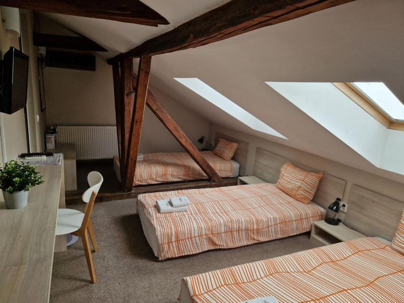 Quadruple Room with Private Bathroom image 2