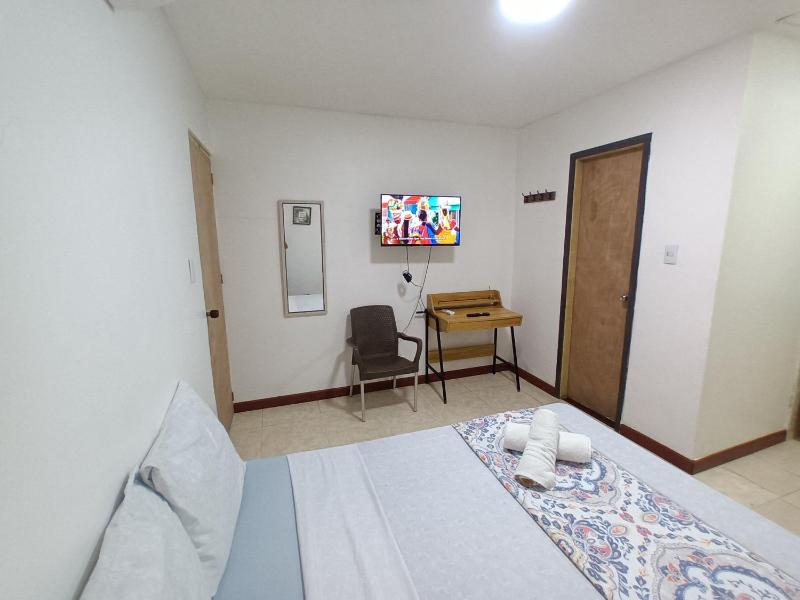Confortable y Central Habitacion cerca a la Playa Spratt Bight y Malecon - image 4