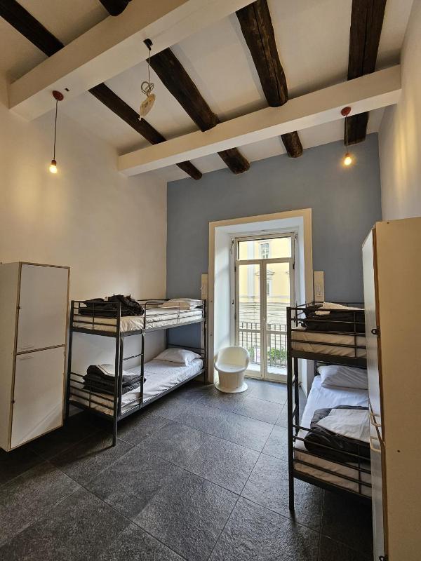 Bed in 4-Bed Mixed Dormitory Room with En suite Bathroom  image 1