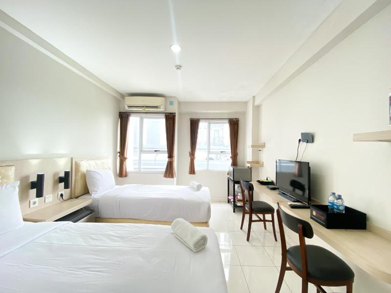 Comfort and Homey Studio Room (No Kitchen) Elvis Tower Apartment By Travelio - image 15