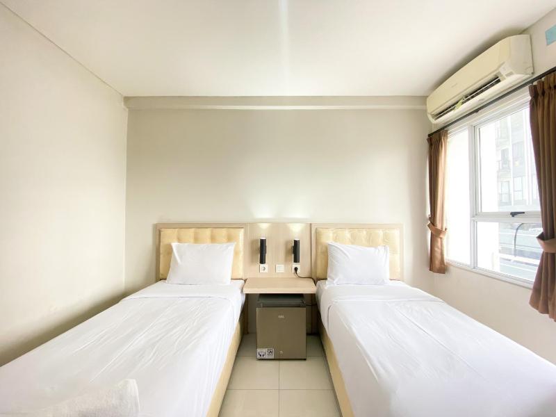 Comfort and Homey Studio Room (No Kitchen) Elvis Tower Apartment By Travelio - image 1