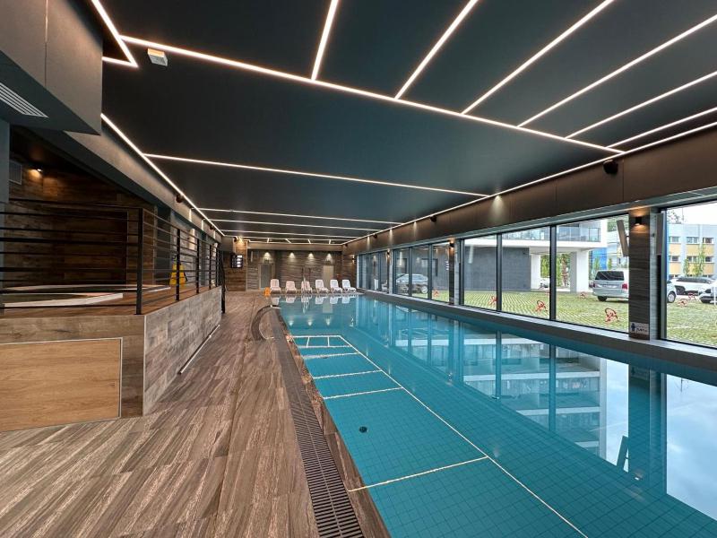 Kasprowicza 20 Luxury Apartments - Free Pool Saunas Salzgrotte Jacuzzi Gym Children's Playroom Fitness - image 39