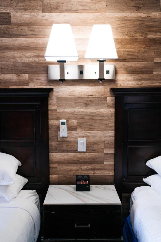 Queen Suite with Two Queen Beds with Sofa Bed image 4