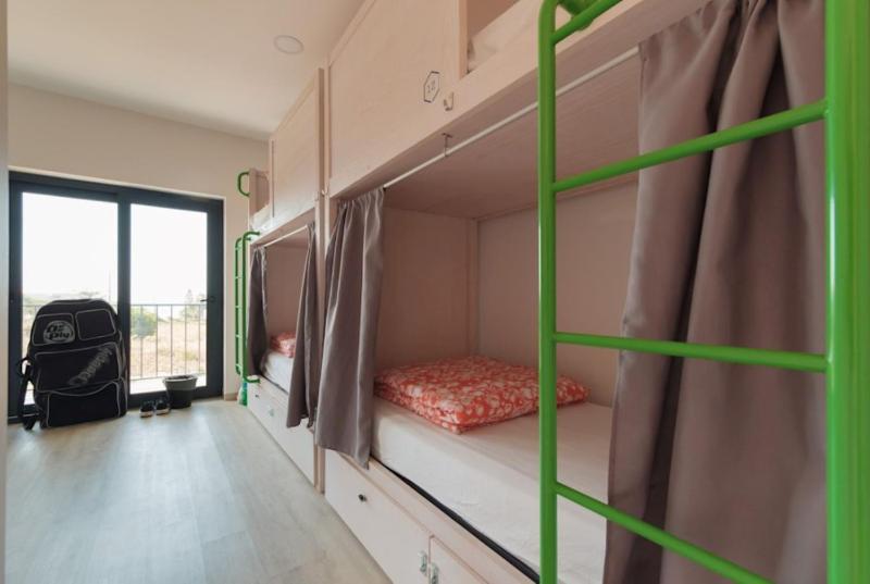 Bed in 12-Bed Dormitory Room with Ensuite Bathroom image 4