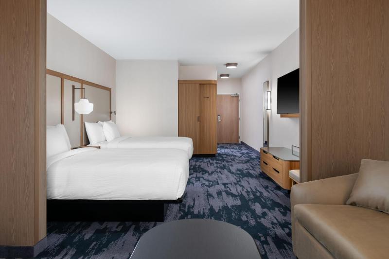 Extended Queen Suite with Two Queen and Sofa Bed image 1