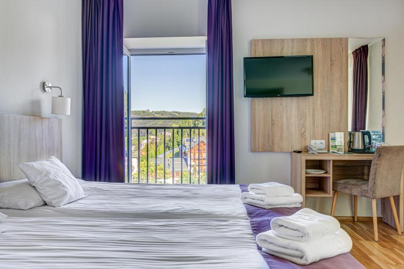 Triple Lux Room with a French Balcony image 1