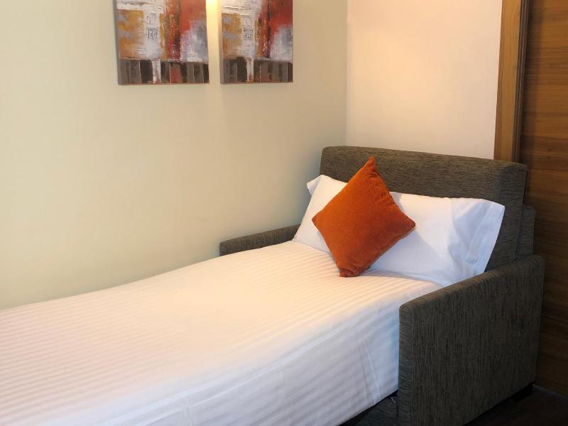 Triple Room (2 Adults + 1 Child) image 1